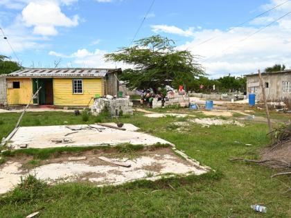 A section of a yard in Parottee, St Elizabeth, belonging to residents who have been still struggling to rebuild after last year’s onslaught from Hurricane Beryl.