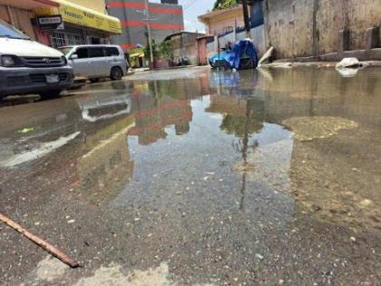 Flooding along Morrison Street in Spanish Town, St Catherine following torrential rains in July 2024. 