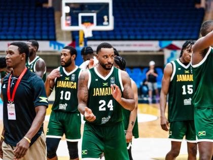 Jamaica and Miami Heat player Norman Peart tries to motivate his players during a FIBA Basketball 
pre-qualification competition recently. 