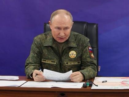 In this image made from video released by the Russian Presidential Press Office on October 26, 2025, Russian President Vladimir Putin speaks while visiting one of the command posts of the Joint Group of Forces. 