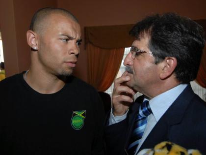 Deon Burton (left) and Brazilian Rene Simoes, Jamaica’s coach in 1998.