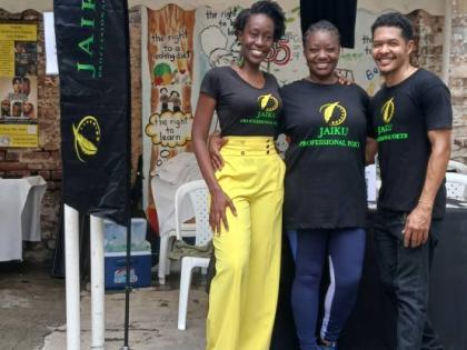 From left: Poet Kacy Garvey, co-founder and managing director of JAIKU; Jodiann Edwards, executive assistant; and poet Britton Wright, co-founder of JAIKU; at Kingston Creative’s ‘Demo Day’ on Sunday, September 28, in downtown Kingston.