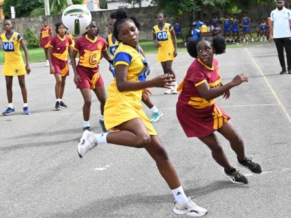Action in the ISSA Urban Schoolgirl Netball competition between Wolmer’s Girls (in maroon) and Merl Grove at Wolmer’s Girls’ School on Friday, September 27, 2024..