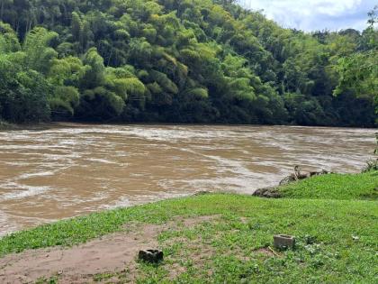 The murky Rio Grande, swollen by Hurricane Melissa, reportedly swept away more than 100 rafting vessels.