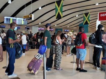 Tourists in the departure area at the Sangster International Airport in Montego Bay. - File photo.