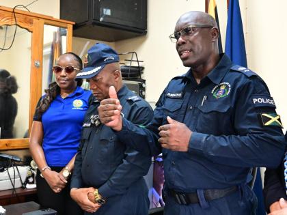 Superintendent of Police Coleridge Minto (right), head of the St Elizabeth Police, speaks with The Gleaner at the Black River Police Station on Thursday. Looking on are Sergeant Arleen McBean, chairman of the Police Federation, and Assistant Commissioner o