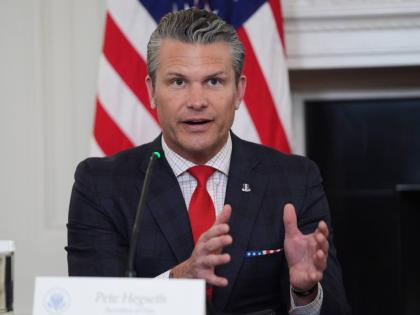 Defense Secretary Pete Hegseth answers a question from a reporter during a roundtable on criminal cartels in the State Dining Room of the White House, Thursday, October 23, 2025, in Washington. (AP Photo/Evan Vucci)