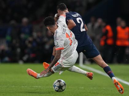 Bayern Munich’s Luis Diaz fouls Paris Saint-Germain’s Achraf Hakimi during the Champions League opening phase match in Paris, France on Tuesday.