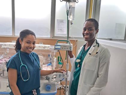 Dr Shantelle Broughton – Pittergill, senior registrar and Dr Debra Hall-Parkinson, Consultant Paediatrician in the Neonatal Intensive Care Unit (NICU), Bustamante Hospital for Children share a moment in setting up newly provided infusion pump to ensure a