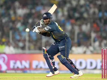 Gujarat Titans batsman Sherfane Rutherford plays a shot during his innings of 46 against the Punjab Kings at the Narendra Modi Stadium, in Ahmedabad yesterday.