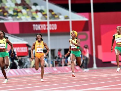 From left: Shericka Jackson, Marie-Josee Ta Lou, Shelly-Ann Fraser-Pryce, and Elaine Thompson-Herah compete in the 100m women’s finals at the Tokyo 2020 Olympic Games.