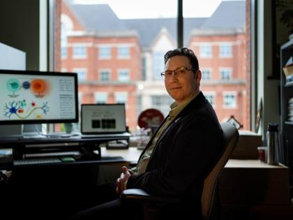 Biomedical engineer Jordan Green sits for a photo in his office at Johns Hopkins University in May 2025, in Baltimore, USA. 							