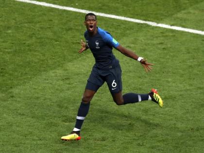 France’s Paul Pogba celebrates after scoring his side’s third goal during the final match between France and Croatia at the 2018  World Cup in the Luzhniki Stadium in Moscow, Russia, on Sunday, July 15, 2018.