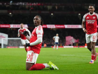 Arsenal’s Eberechi Eze celebrates after scoring during a Premier League match between Arsenal and Tottenham in London yesterday.