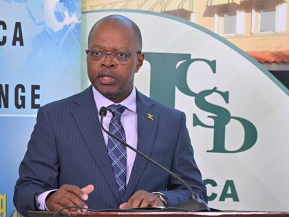 Chief Executive Officer of the Jamaica Stock Exchange (JSE), Livingston Morrison, addresses the JSE Market Research Awards held on November 20 at the JSE’s Harbour Street offices in Kingston..
