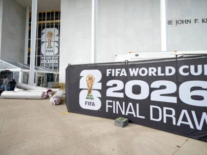 The red carpet is delivered prior to the final draw for the 2026 football World Cup at the Kennedy Center in Washington yesterday.