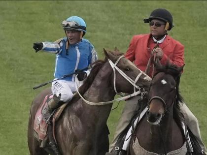  Venezuela-born, United States-based jockey Javier Castellano (left) celebrates after riding Mage to win the 149th running of the Kentucky Derby horse race at Churchill Downs Saturday, May 6, 2023. Castellano, 48, will be in action in the Mouttet Mile at C