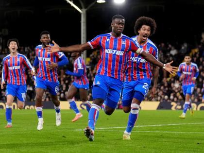 Crystal Palace’s Marc Guehi (front) celebrates after scoring his side’s second goal during the English Premier League  match between Fulham and Crystal Palace in London yesterday.