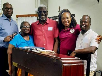 From left: Chaplain Reverend Karl Henlin, past member Grace England, guitarist Lewis Campbell, pianist Karen Henry and drummer Odean Taylor after the Portmore Chorale’s Christmas concert at the Church of the Holy Spirit.