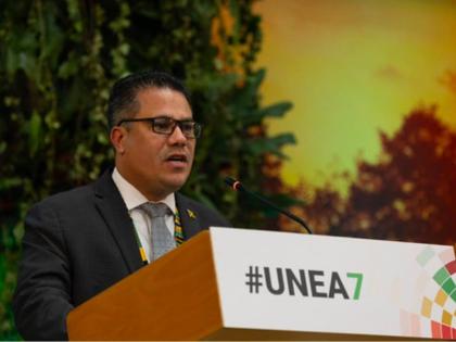 Jamaica’s Minister of Water, Environment, and Climate Change, Matthew Samuda, addresses delegates at the United Nations Environment Assembly in Nairobi, Kenya, on December 12, following his election as president. 