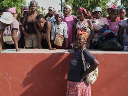 Residents attend the funeral of people killed in a landslide triggered by Hurricane Melissa in Petit-Goave, Haiti, Saturday, November 15.