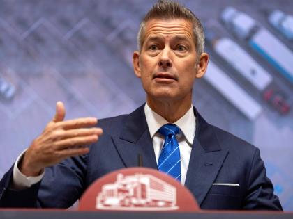 Transportation Secretary Sean Duffy speaks during a news conference at the Department of Transportation in Washington, Friday, December 12, 2025. (AP Photo/Mark Schiefelbein)