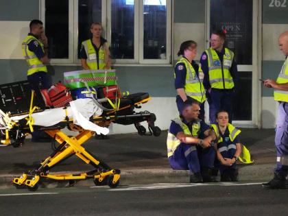 Emergency workers standby at Bondi Beach after a reported shooting in Sydney, Australia on December 14, 2025. 