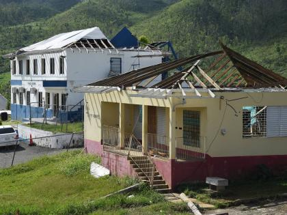 Damaged roofs of Lewisville Police Station and post office, blown away by Hurricane Melissa.