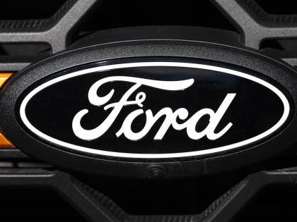 The company logo is shown on the grille of an unsold 2026 F-series pickup truck on the lot of a Ford dealership, Sunday, Nov. 2, 2025, in Littleton, Colo. (AP Photo)