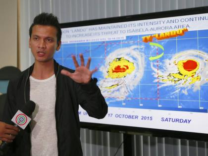 Aldczar Aurelio, a weather bureau forecaster, gesturing during a broadcast as typhoon Koppu approached the Philippines a decade ago. 