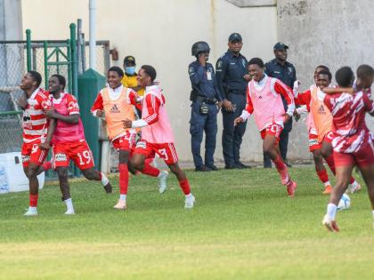 Glenmuir High players celebrate after securing their place in the ISSA daCosta Cup final with a 2–1 victory over Dinthill Technical in their semifinal match at Sabina Park in Kingston on December 17, 2025.