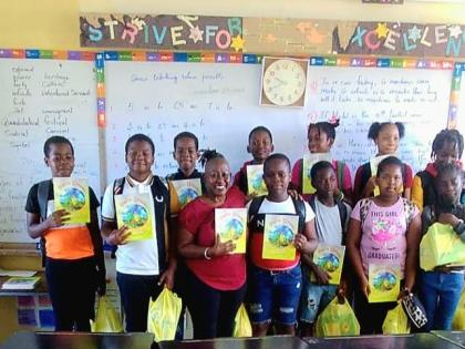 Students of Chester Castle Basic and Primary School pose for a photo.