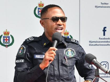 Assistant Commissioner of Police (ACP) Christopher Phillips, who has responsibility for Area Five, addresses the launch of the 'Shop with a Cop' initiative at the Greater Portmore Police Station (100-Man) in St Catherine on December 19.
