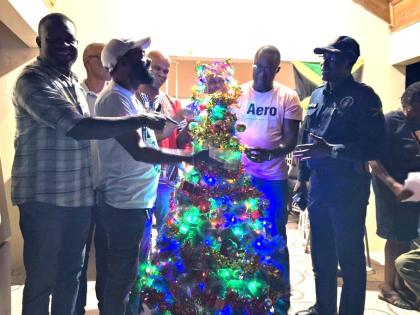 From left: Errol Lebet, chief executive officer, St Elizabeth Municipal Corporation; Richard Solomon, mayor of Black River; Dwight Salmon, councillor for the Black River Division; and Superintendent Coleridge Minto, head of the St Elizabeth Police Division