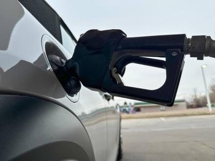 AP
A motorist fills up the tank of a vehicle at a gasolene station Sunday on November 30. 