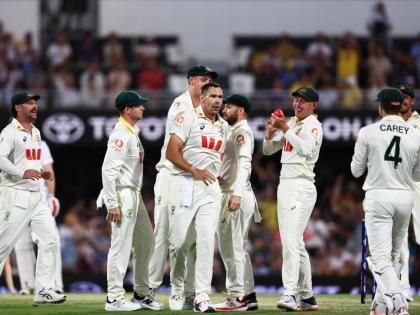 Australia’s Scott Boland (centre) celebrates with teammates after capturing the wicket of England’s Ben Duckett during the second Ashes cricket Test match between Australia and England in Brisbane, Saturday, December 6, 2025.