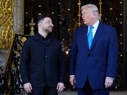 US President Donald Trump greets Ukraine's President Volodymyr Zelenskyy at his Mar-a-Lago club on December 28, 2025, in Palm Beach, Florida.