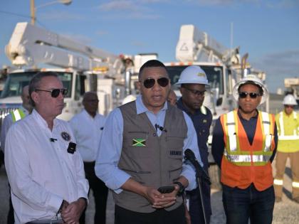 Prime Minister Dr Andrew Holness speaking at a ceremony on January 2, 2026 for the arrival of 150 specialised trucks to be deployed by the Jamaica Public Service for Hurricane Melissa electricity restoration.