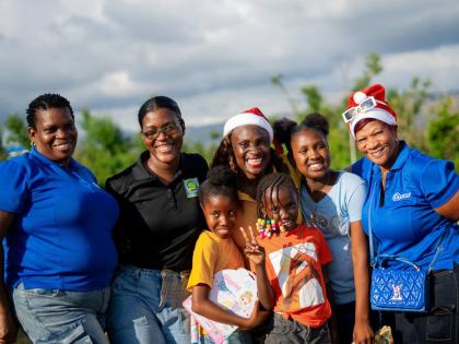 From left: Cassitta McKenzie, Musson Group volunteer; Vanessa Nelson, project and programme coordinator, Seprod Foundation; Jennifer Small, director, Jenny Jenny Foundation; and Marcia Hall, Musson Group volunteer share smiles during the Crawford Primary S