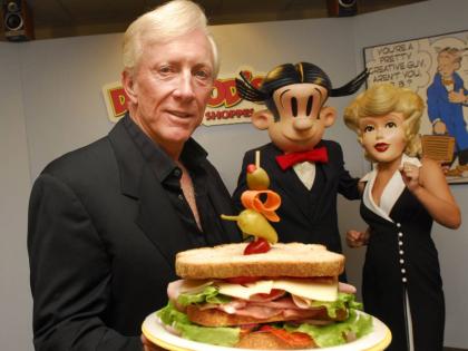 Dean Young shows off one a Dagwood sandwich at his New Orleans, USA-based test kitchen on May 9, 2006. 