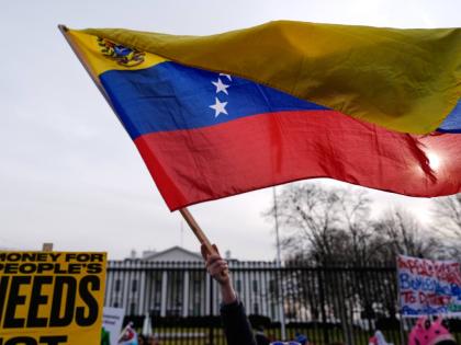 Protesters rally outside the White House on Saturday, January 3 in Washington, after the US captured Venezuelan President Nicolás Maduro and his wife in a military operation.