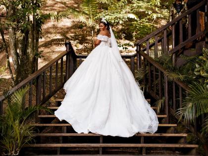 Drawn to dresses with intricate embellishments, Kimberly Magnus said yes to this stunning ball gown from Exquisite Bridal Boutique.  