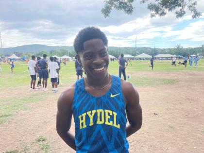 Hydel High School’s Robert Miller is all smiles after breaking the Class 1 boys’ 400-metre hurdles and 110-metre hurdles records at the Purewater/R Danny Williams JC Meet on Saturday.