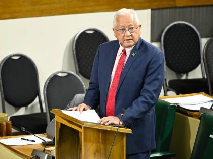 Minister of Justice and Constitutional Affairs, Delroy Chuck, delivering a statement in the House of Representatives on January 13.