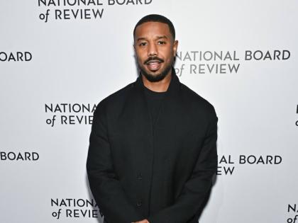 Michael B. Jordan arrives at the National Board of Review Awards in a sleek, all-black look.