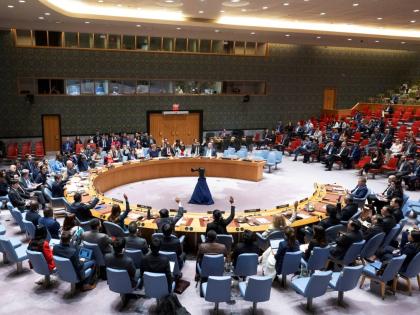 In this photo provided by the United Nations, members of the UN Security Council vote to approve its first resolution endorsing a cease-fire plan aimed at ending the eight-month war between Israel and Hamas in Gaza, Monday, June 10, 2024. (Eskinder Debebe/