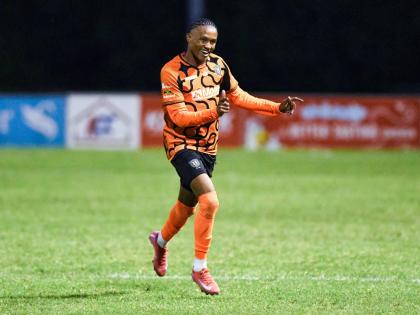 Nickalia Fuller of Tivoli Gardens FC celebrates scoring a goal of the Jamaica Premier League football match against Waterhouse Football Club at Stadium East on December 8, 2025.