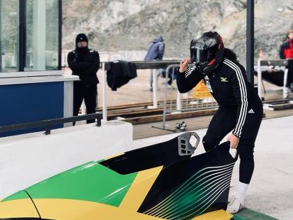 Jamaica’s entrant to the mono-bob competition at this year’s Winter Olympics, Mica Moore gets ready for a run.
