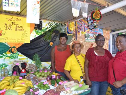 Members of the JAS Perth Town Farmers Group in Trelawny display their produce at the 2019 Hague Agricultural Show.