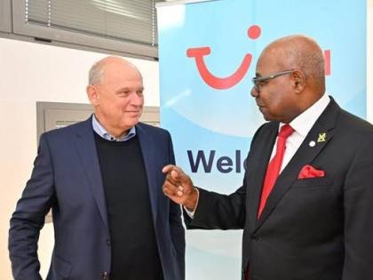 Minister of Tourism, Edmund Bartlett, in discussion with Sebastian Ebel, CEO of TUI Group, at a meeting at FITUR in Spain on Thursday January 22,2026.